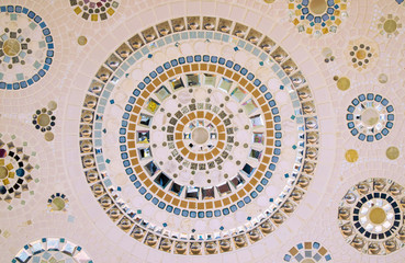 Abstract beige wall tiles texture and surface for background, Decoration of colored stones with pastel tones