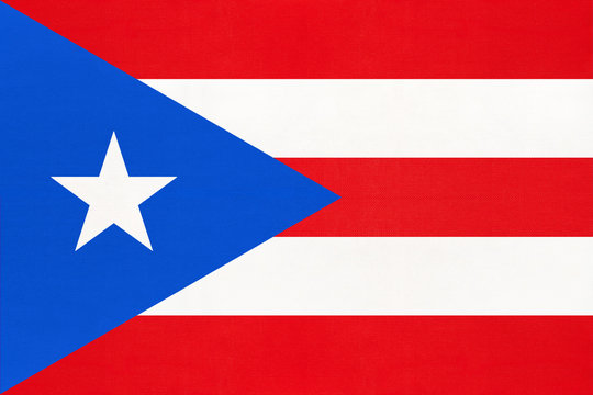 Puerto Rico national fabric flag, textile background. Caribbean state official sign.