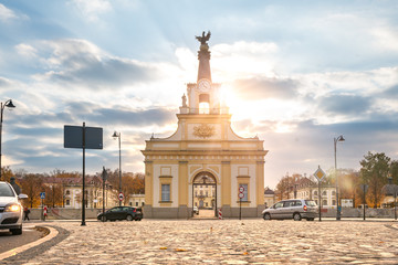     Branicki Palace in Bialystok in Poland at sunlight in autumn scenery. The entrance gate to the palace. 