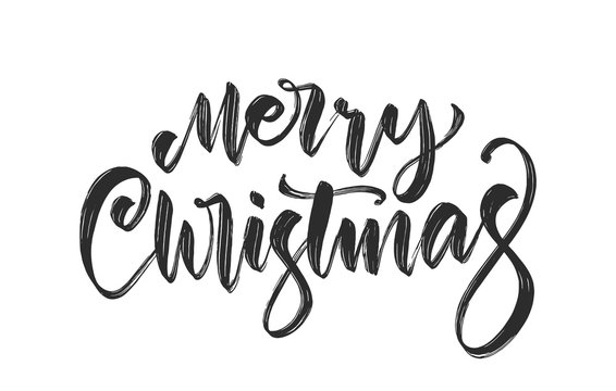 Handwritten calligraphic brush lettering of Merry Christmas isolated on white background.