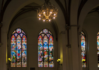 Church interior with medieval stained glass, Europe