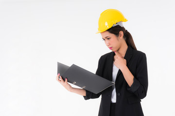 woman Standing and Looking at the documents in the file with suspicion