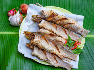 fried fish  delicious on the banana leaf