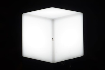 a white light cube on a black background