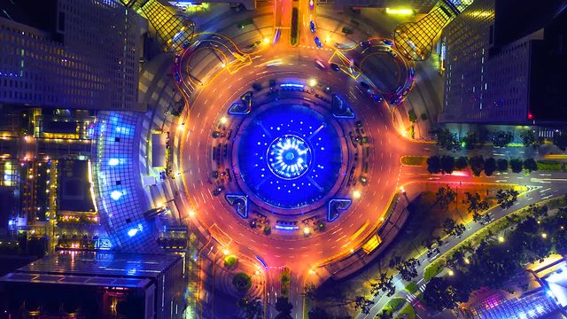 4K, Time lapse traffic at fountain of wealth roundabout at Night Singapore