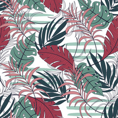 Summer seamless tropical pattern with beautiful pink and green plants and leaves on white background.  Modern abstract design for fabric, paper, interior decor. Beautiful exotic plants. 