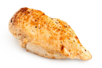 Whole pan roasted chicken breast isolated on white.
