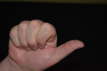 Hand Gesture showing a Thumbs Up