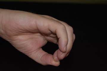 Hand Gesture Showing a Zero Sign