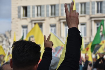 People take part in a demonstration to support Kurdish militants as Turkey kept up its assault on...