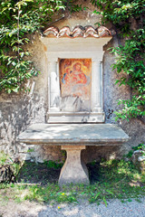 Tabernacle shrine in the courtyard of the charterhouse of Padula, Salerno, Italy © Tony