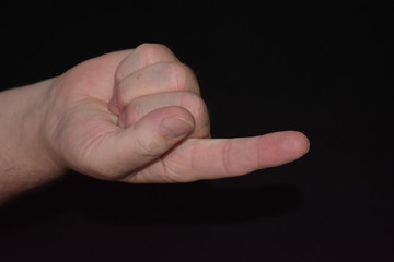 Hand Gesture Holding up One Finger