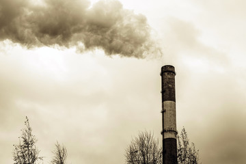 chimney in thermal electric generator plant industry. smoke from the pipes of the factory factory...