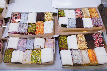 Eastern sweets, confectionery on the counter, Sherbet, Dzhezerye, halva, Turkish delight baklava.