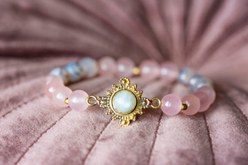 Beautiful mineral stone bracelet on pink velvet
