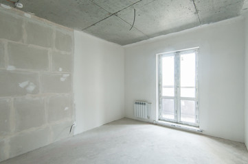 Russia, Moscow- May 21, 2019: interior room apartment. standard repair decoration. rough repair for self-finishing. finishing stage of construction