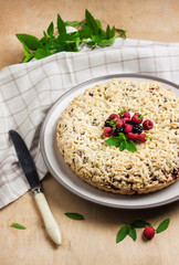 Closeup of berry pie with cottage cheese cut on square slices
