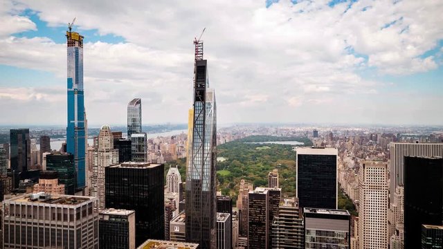 Time lapse of clouds drifting over the skyscrapers on the edge of Central Park and the upper east side of NEW YORK CITY, USA