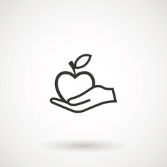 Apple in hand icon. Hand holding an apple, logo on white background.