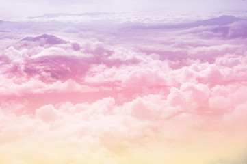 Fototapeta beautiful fantasy pastel clouds againt with top of hill as paradise background obraz
