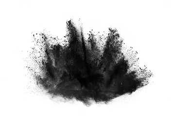 Particles of charcoal on white background,abstract powder splatted on white background,Freeze...