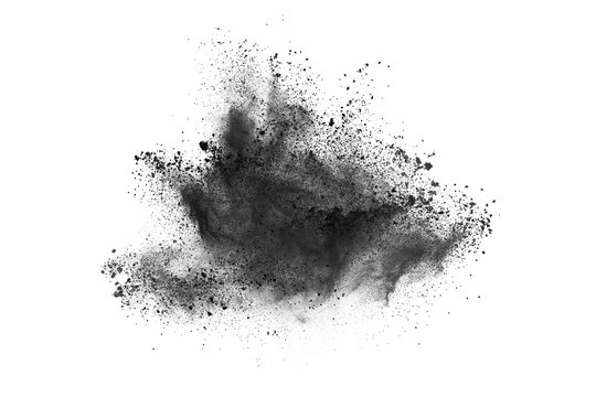 Particles of charcoal on white background,abstract powder splatted on white background,Freeze motion of black powder exploding or throwing black powder.