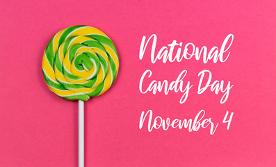 National Candy Day images. Yellow green spiral lollipop. Colorful round lollipop on a pink background. National Candy Day Poster, November 4. American holiday