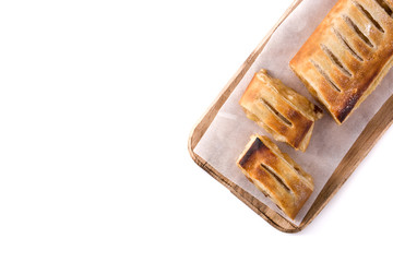 Traditional homemade apple strudel slice isolated on white background. Top view. Copy space