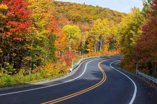 Autumn road in Mauricie national park, Canada