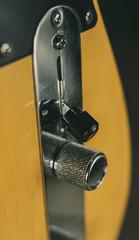 Volume wheel and paddle shift lever of a standard American classic electric guitar
