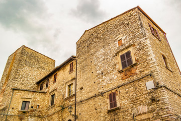 Fototapeta na wymiar View on old palace with medieval flag in the village of Narni, Umbria - Italy
