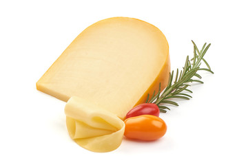 Hard Dutch gouda cheese, isolated on white background