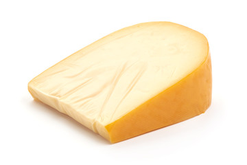 Traditional Dutch Gouda cheese, isolated on white background