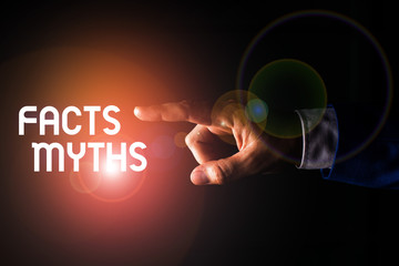 Handwriting text writing Facts Myths. Conceptual photo work based on imagination rather than on...