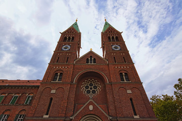 Obraz premium Close-up view of Basilica of Our Mother of Mercy against blue sky. Franciscan church with monastery. Sacred building for locals and famous place and travel destination for other. Maribor, Slovenia