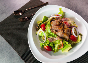 Grilled pork with mixed salad, Delicious meat salad
