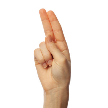Finger spelling letter U in American Sign Language on white background