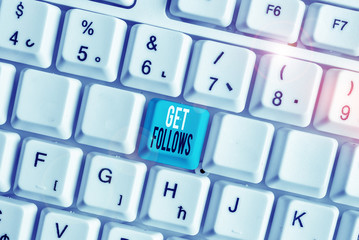 Writing note showing Get Follows. Business concept for demonstrating who imitates copies or takes as model ideal demonstrating White pc keyboard with note paper above the white background