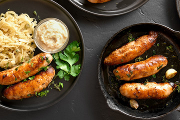 Grilled sausages with sauerkraut and horseradish