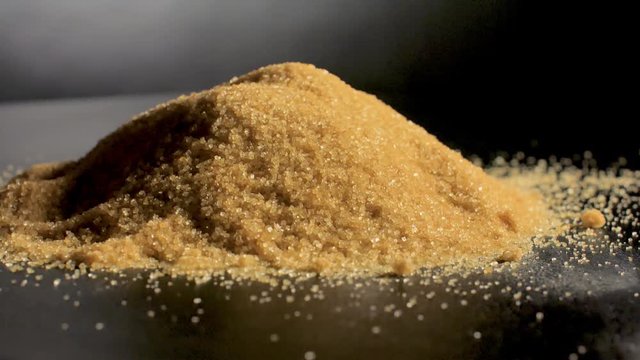 Cane sugar isolated on white background