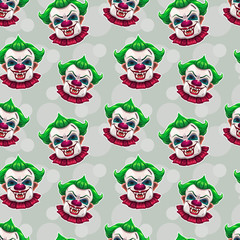 Seamless pattern with crazy scary clown faces.