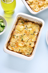 Potato gratin in baking dish