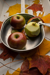 Apples being cut on a military mess kit