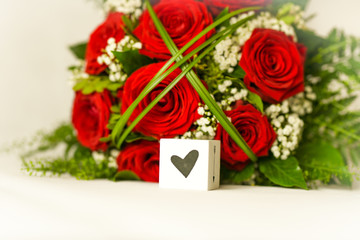 Wedding bouquet of red roses with heart
