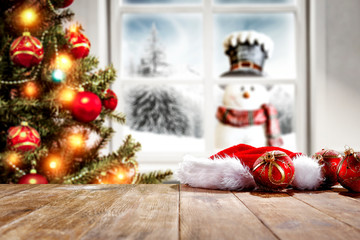 Desk of free space and winter window background 
