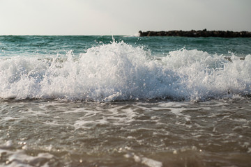 waves crashing on rocks