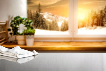 Desk of free space and winter window background 
