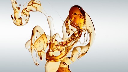 transparent orange gold oil bubbles and fluid shapes in purified water on a white gradient...