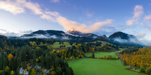 landscape with sky and mountain forest panorama at fall autumn in reutte austria