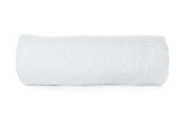 Rolled soft terry towel on white background